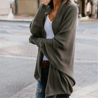 Open vest in oversized vleermuisbreisel